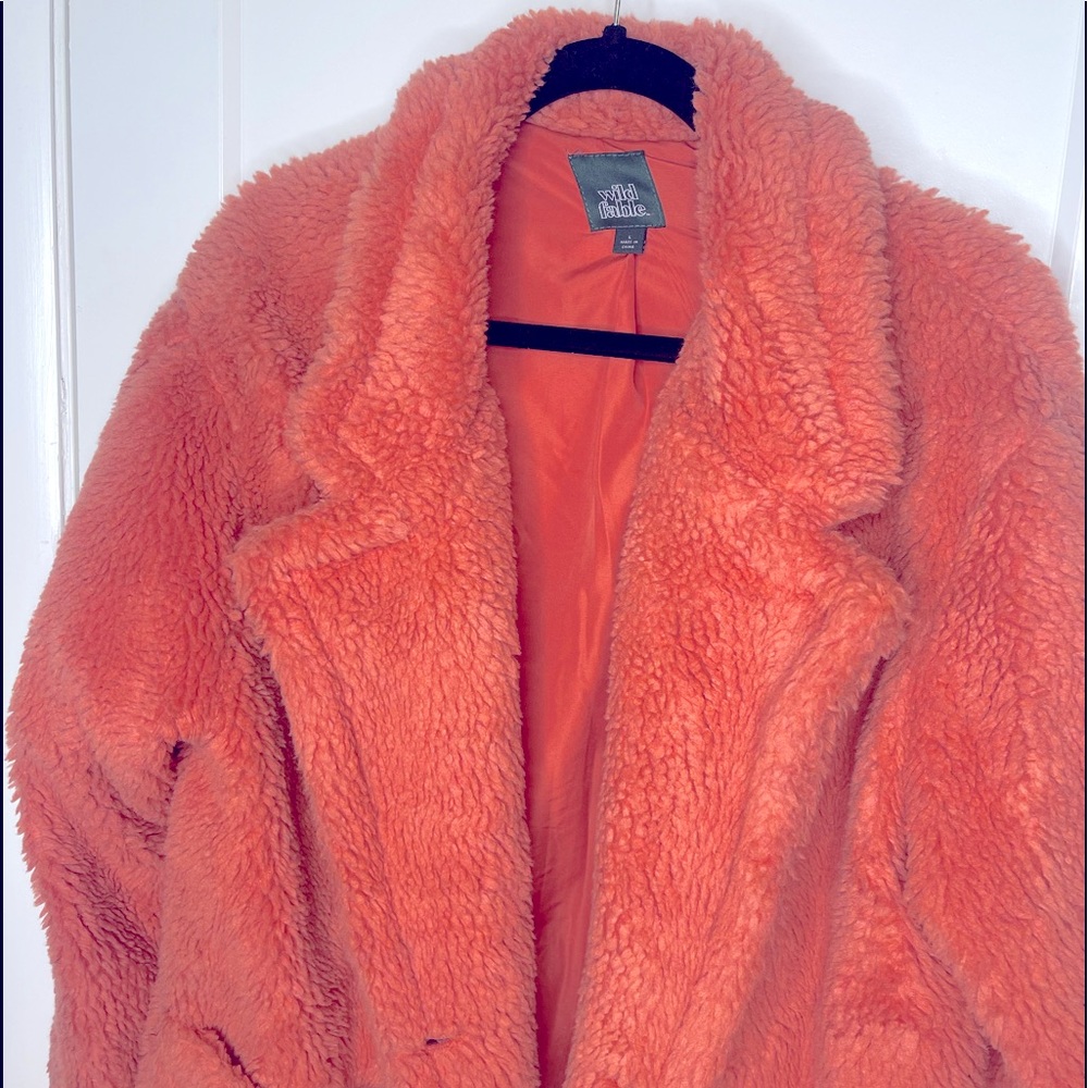 Oversized furry trench.